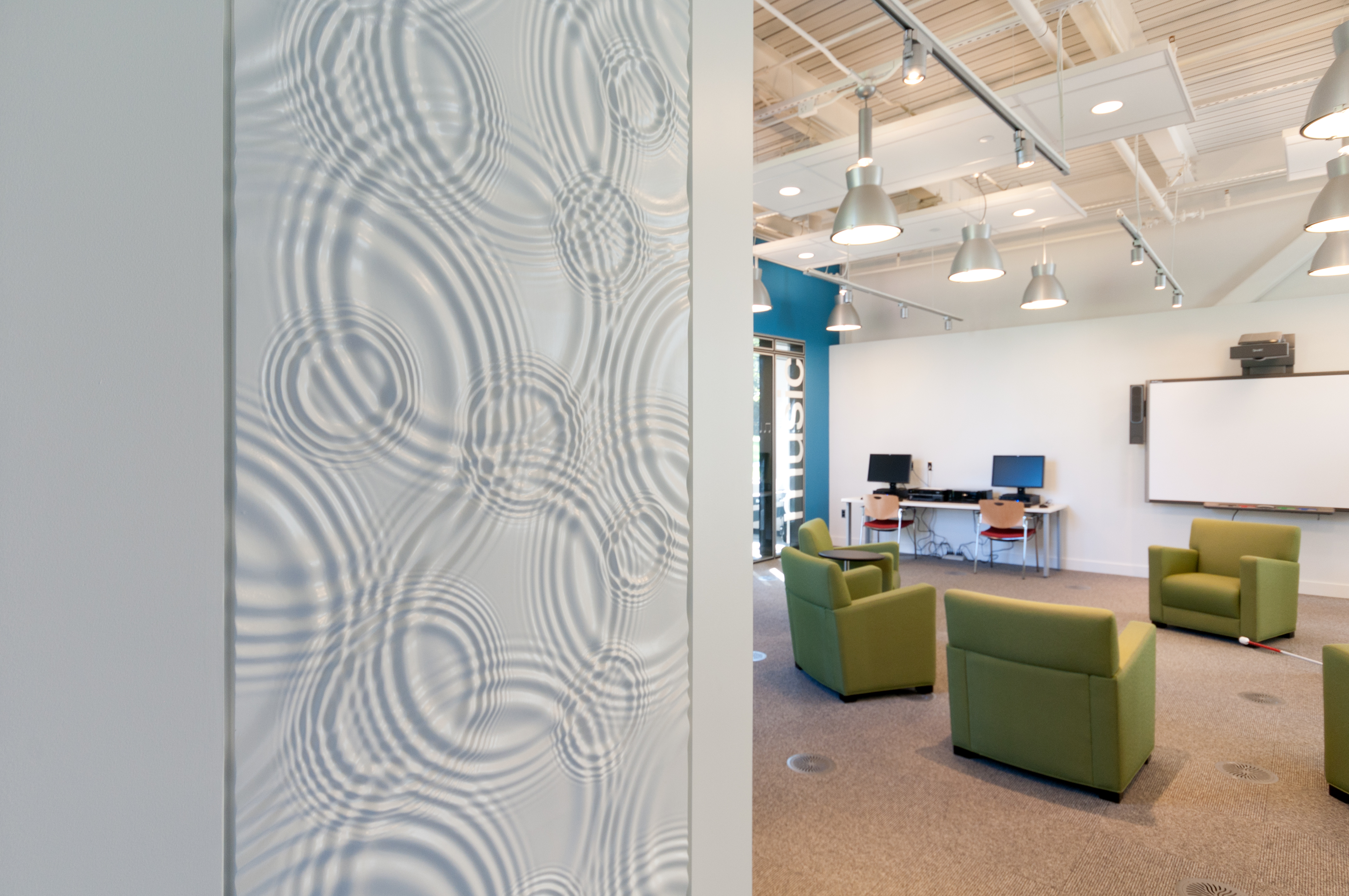 A richly modeled panel on an interior wall.
