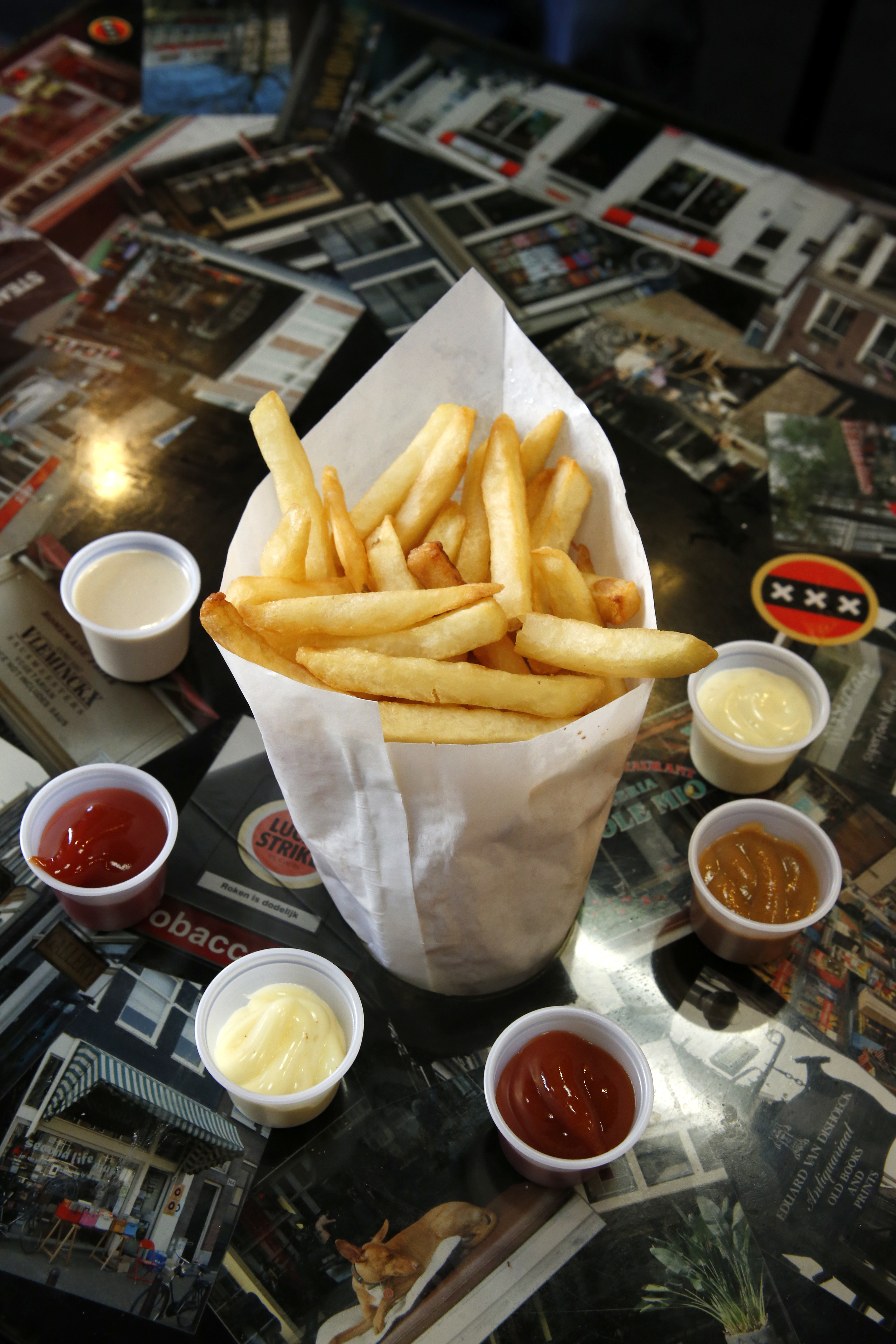 French fries come with dipping sauces.