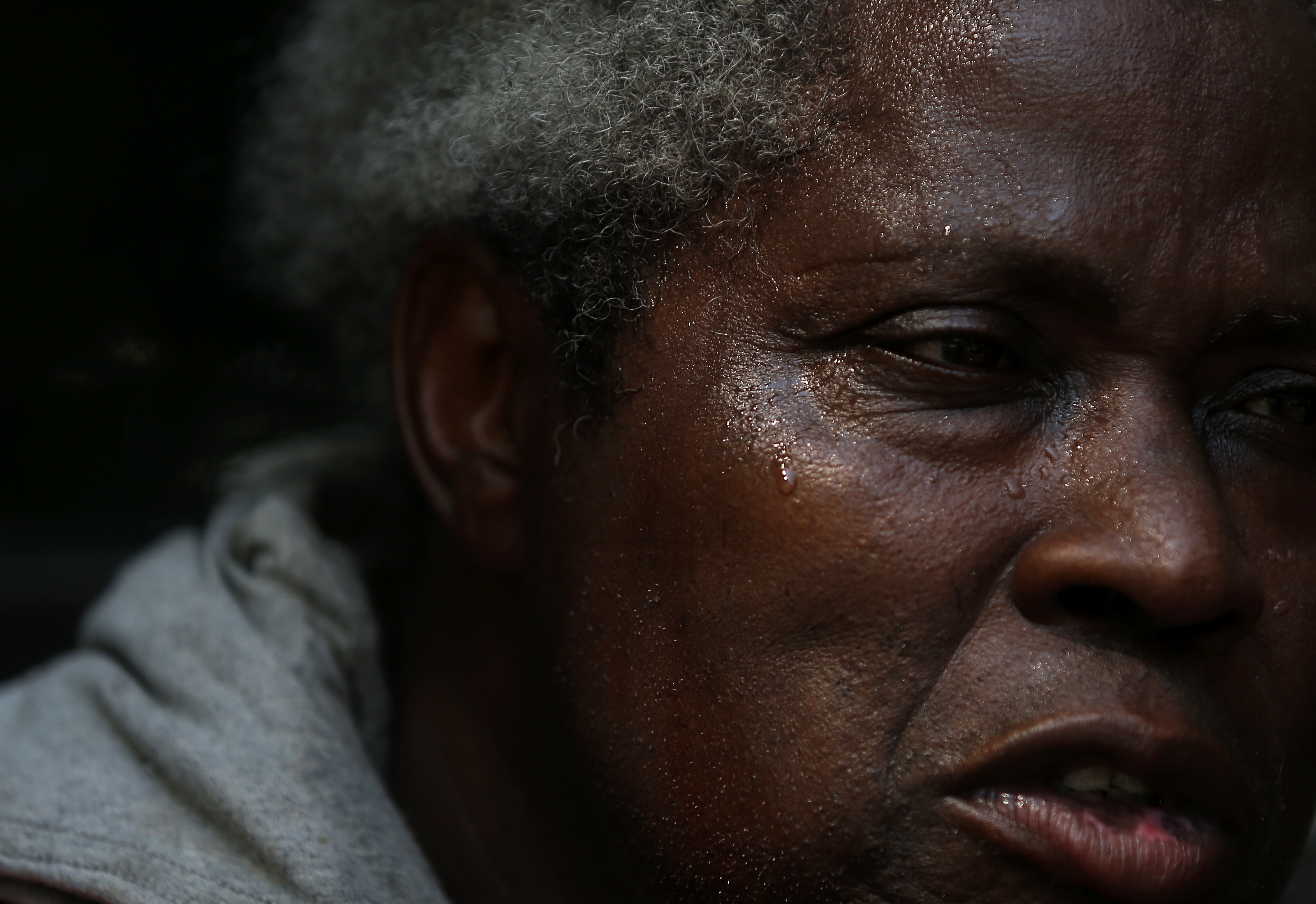 Gary Graham was sweating through the sweltering midday heat in Allston.