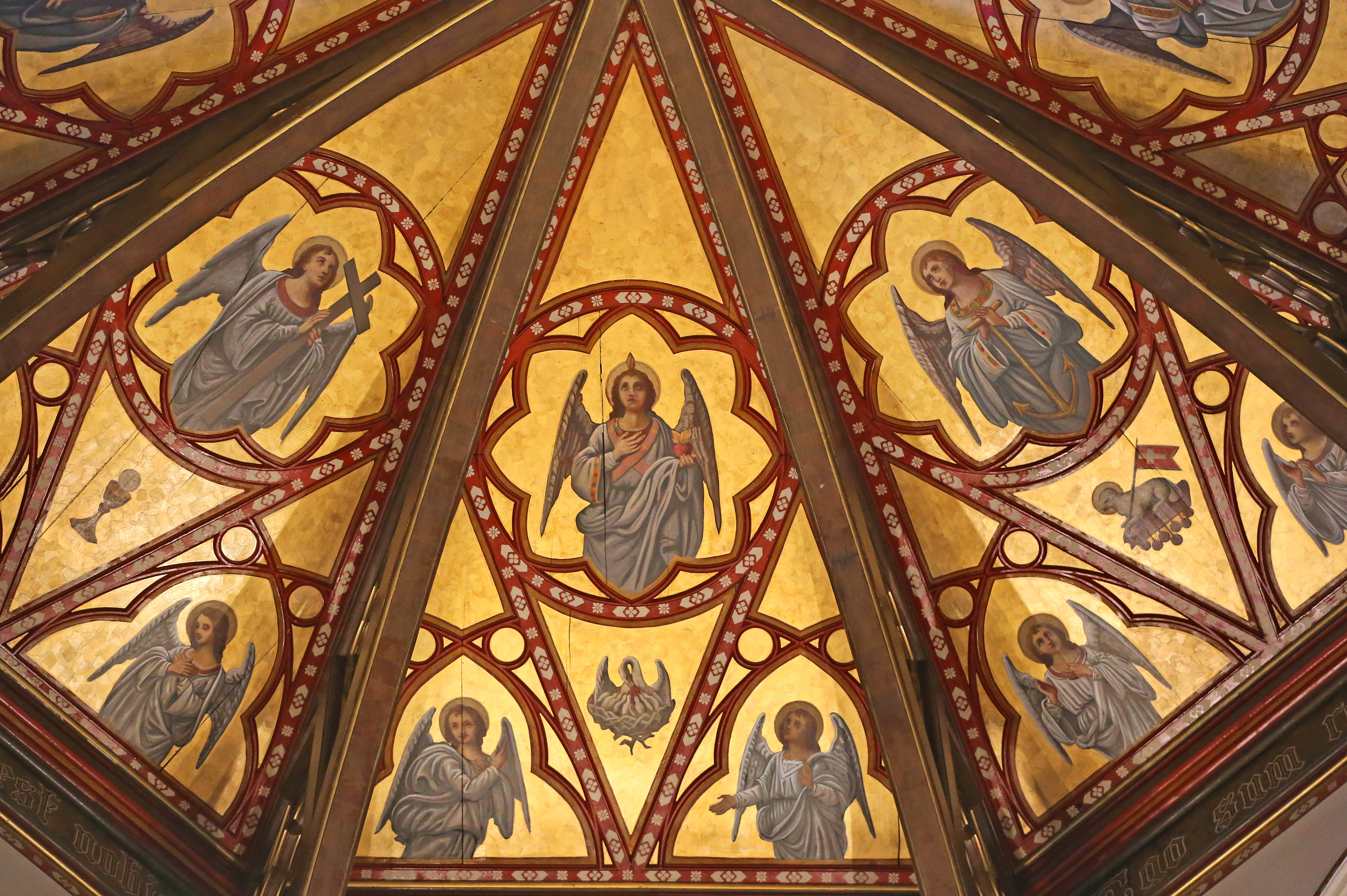 The ceiling panels above the cathedral’s altar were restored.