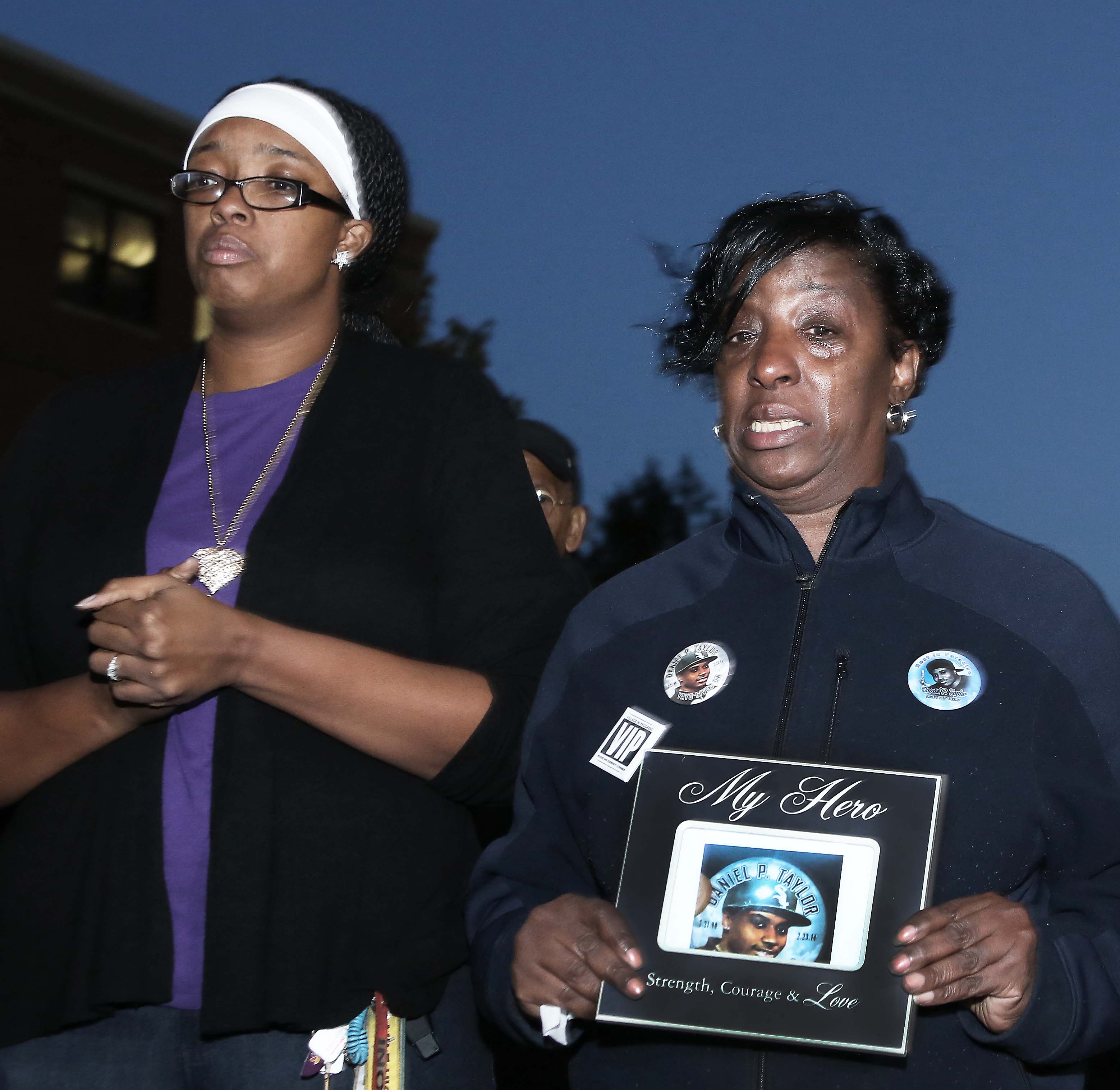 Youth worker Monica Cannon, left, and Leeann Taylor, whose son was murdered in 2014, joined community groups and city officials to call for an end to violence in the streets.