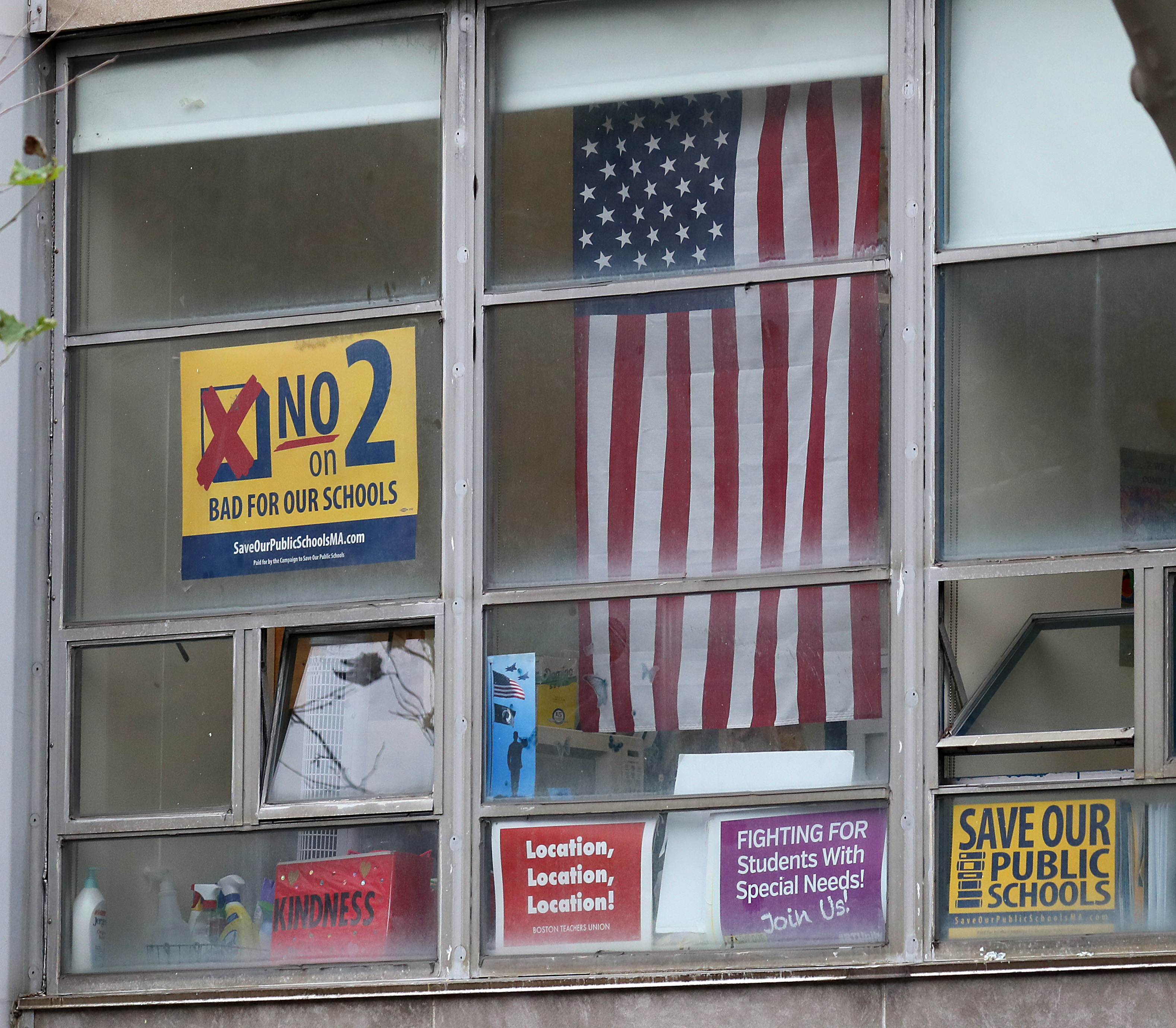A sign against a ballot question to lift the cap on charter schools in Massachusetts was seen at the McKinley South End Academy last month.