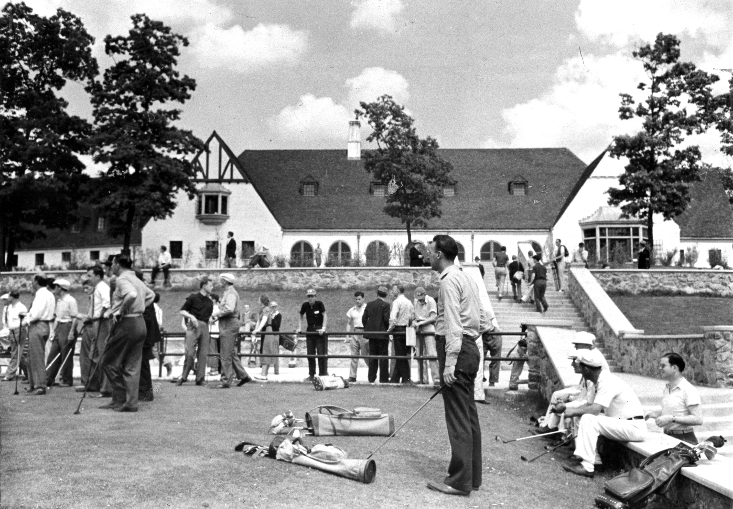 Golfers gathered at the first tee of Boston's newly opened $1 million municipal George Wright Golf Course and country club circa June 1938.