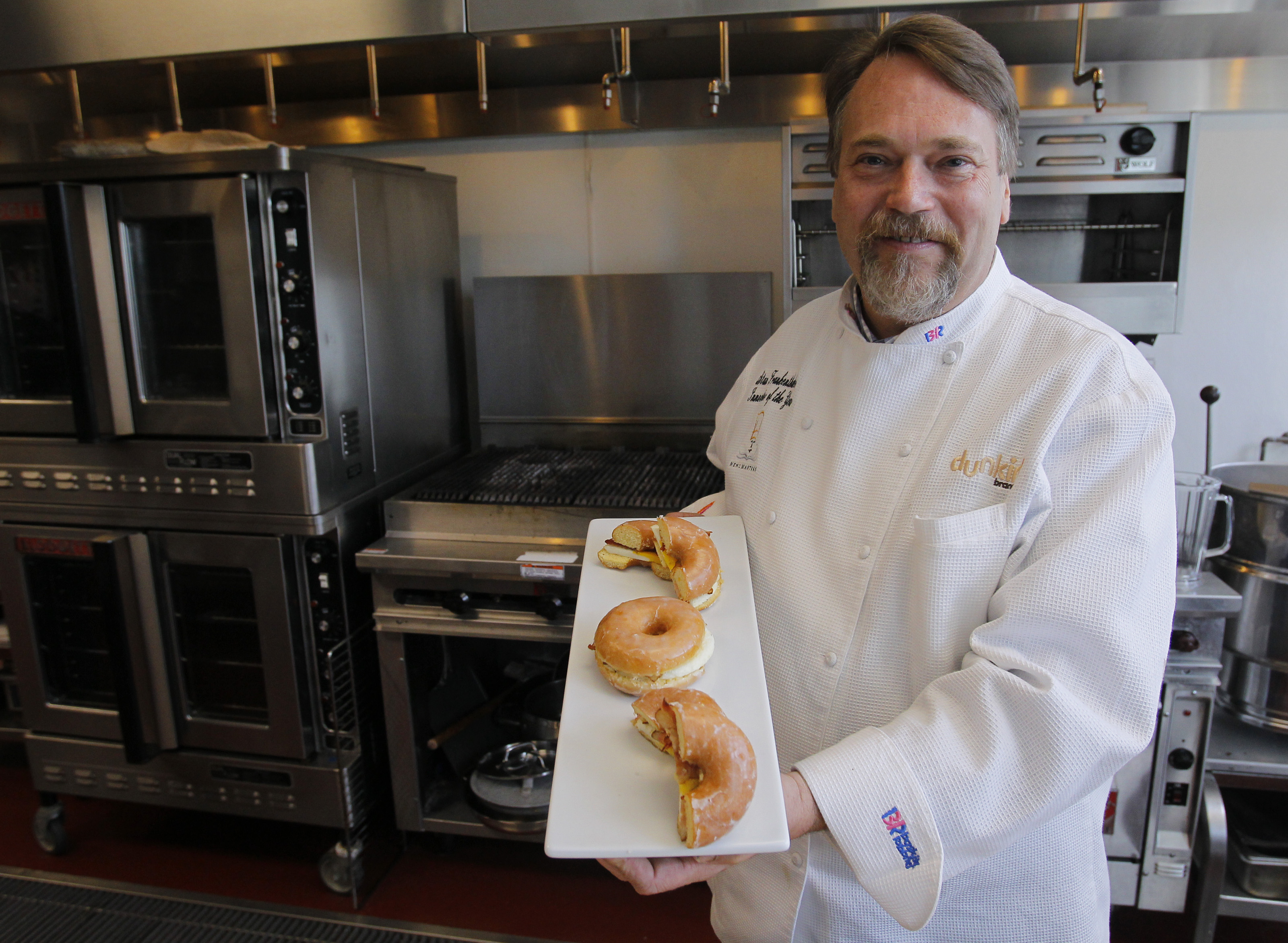 Stan Frankenthaler, Dunkin’ Donuts executive chef, with his sandwich creation.