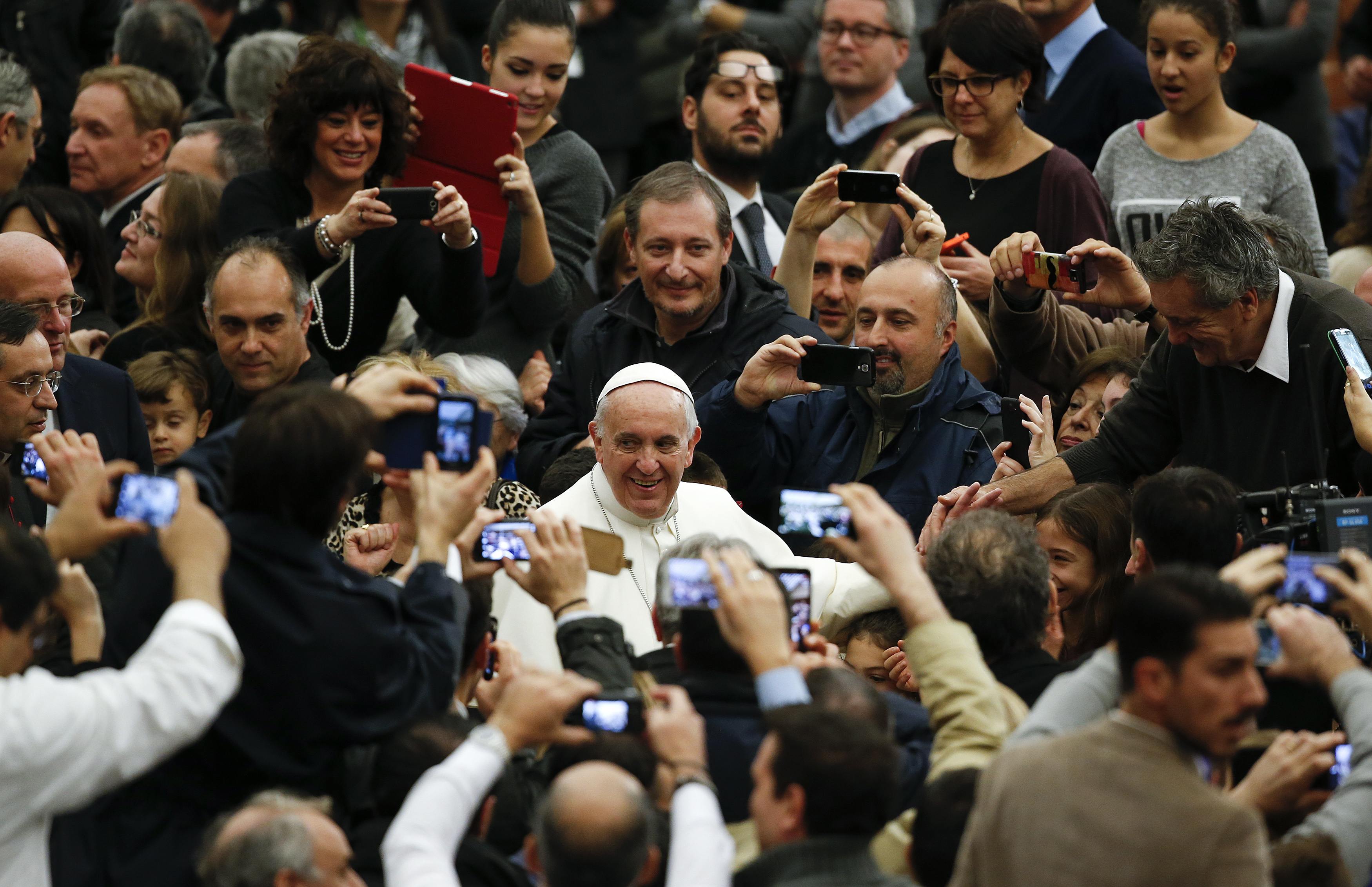 Pope Francis arrived to lead a special audience for Vatican employees at the Paul VI's hall at the Vatican Monday.