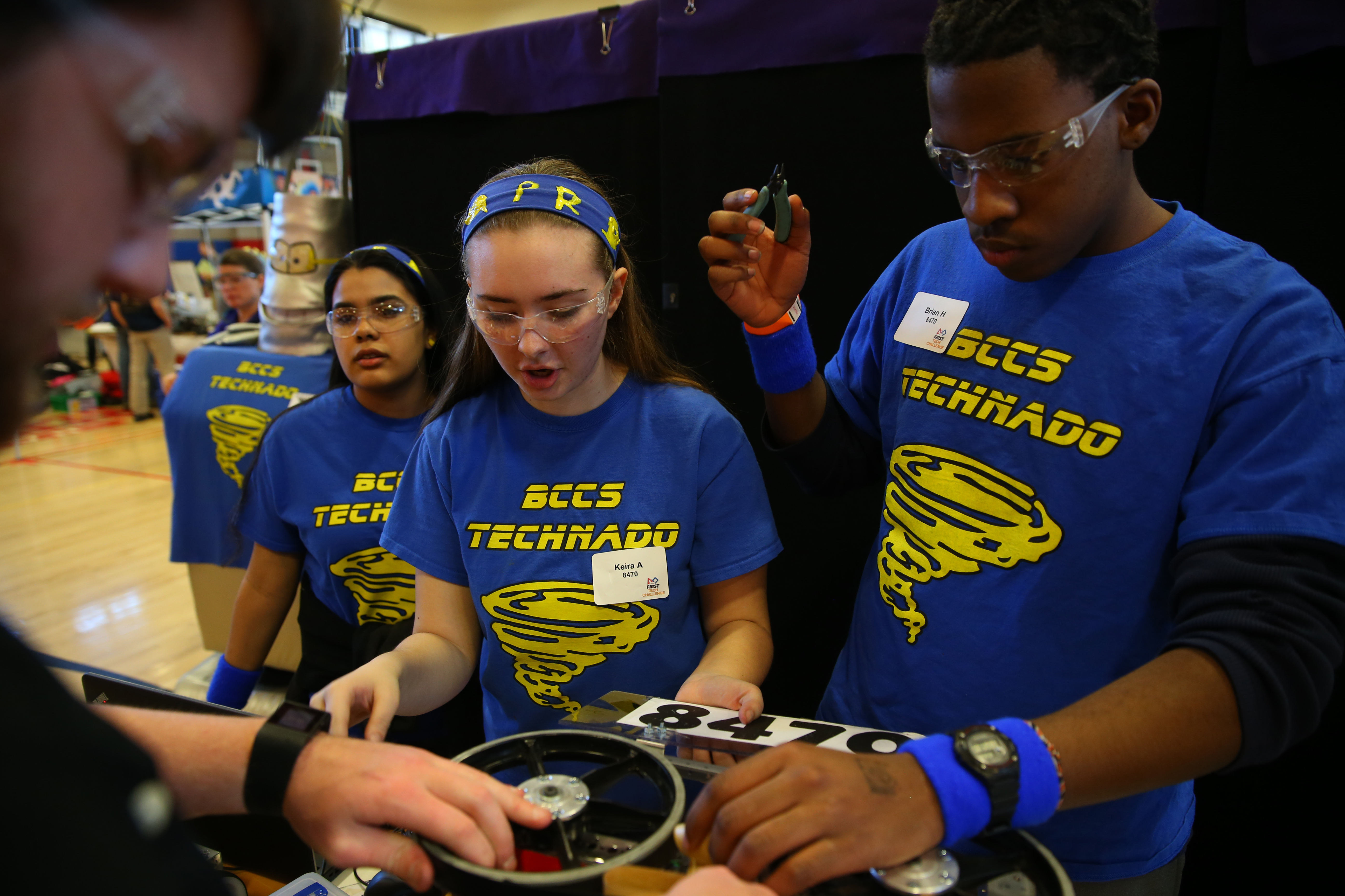 Above, Keira Ahern and Brian Hall from Boston Collegiate Charter School worked on their robot before the competition started.