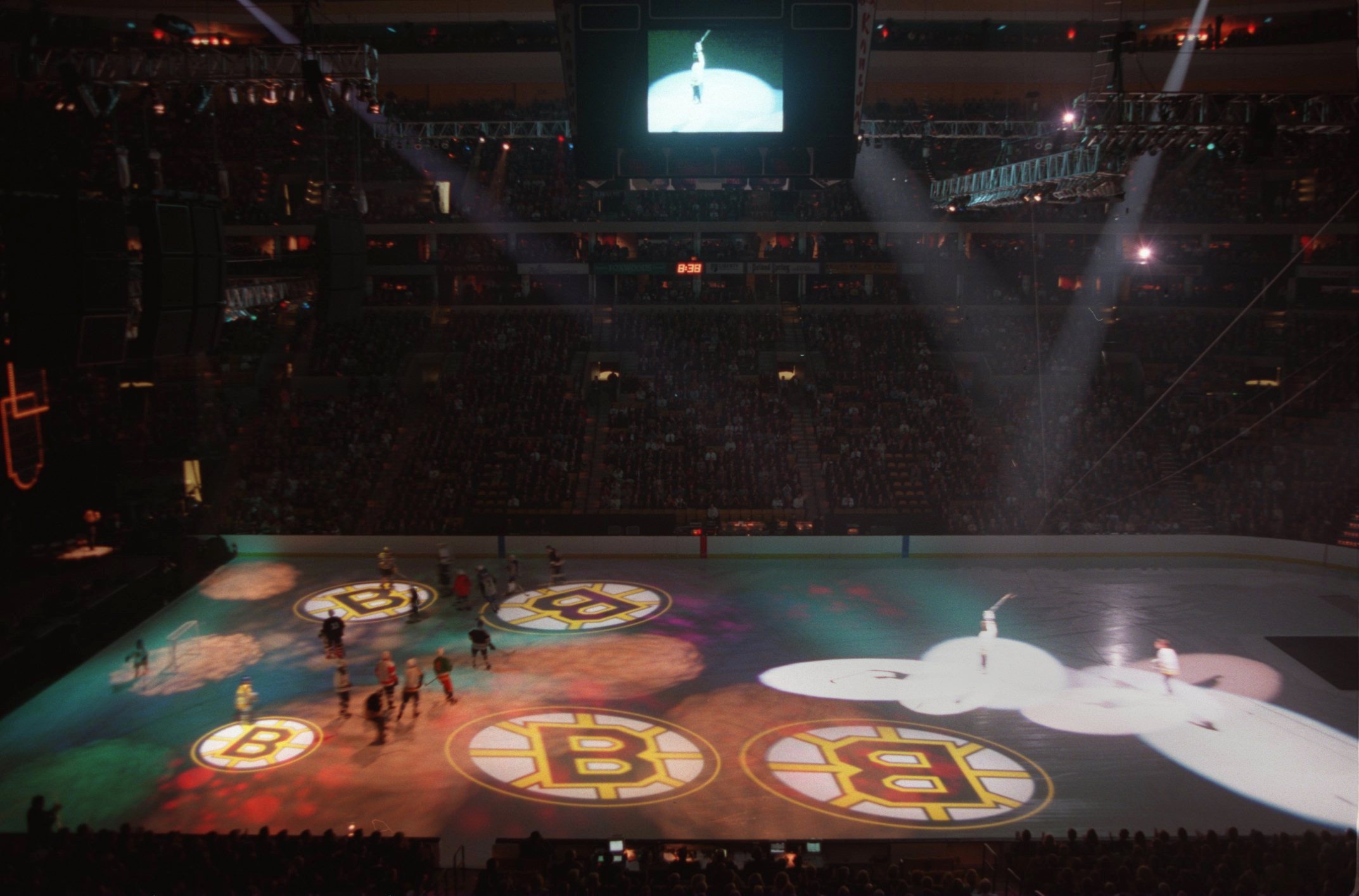 Former Bruins skated around the new ice in 1995.