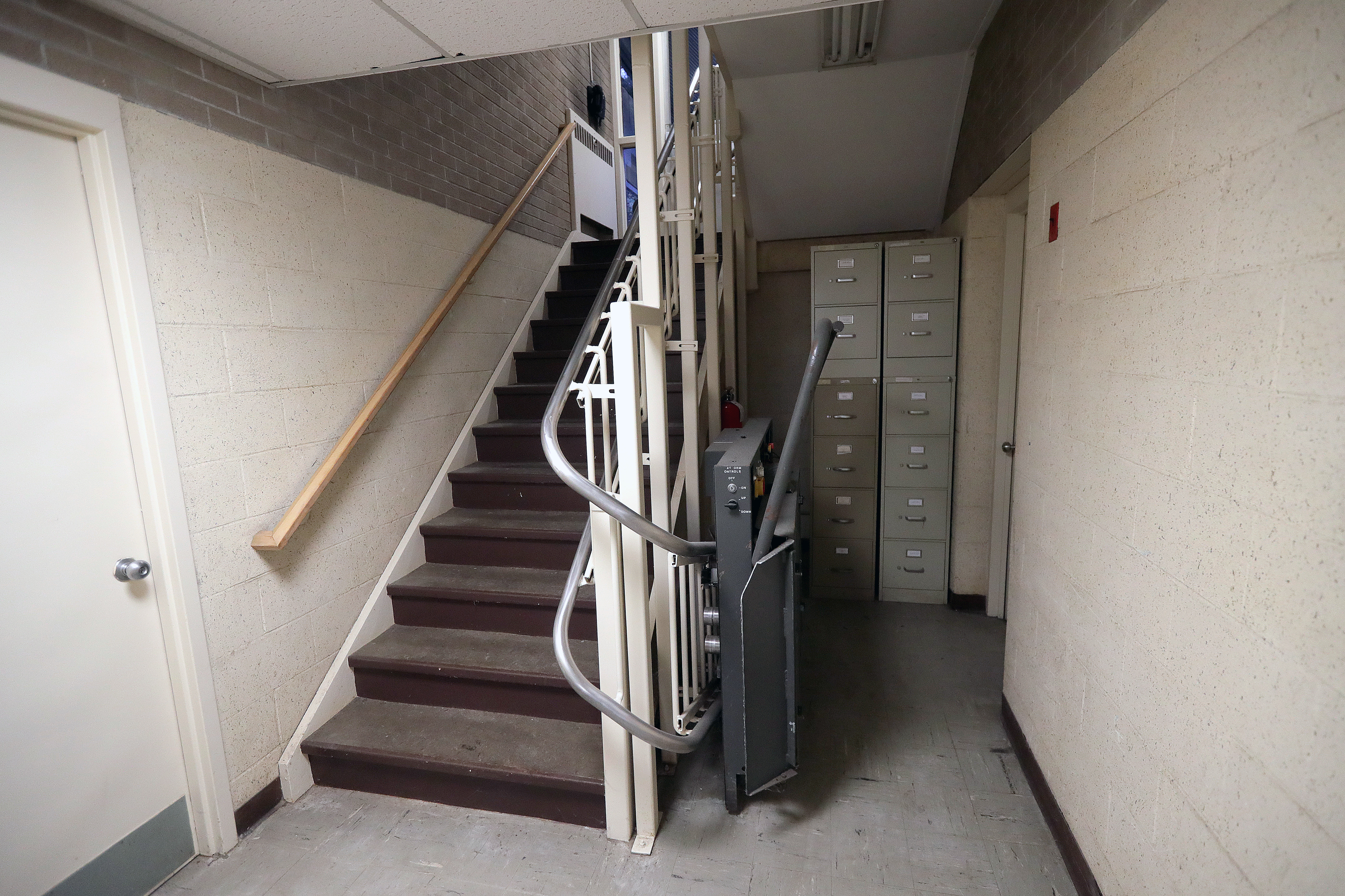 A nonfunctioning chair lift in the basement of Sharon town hall.