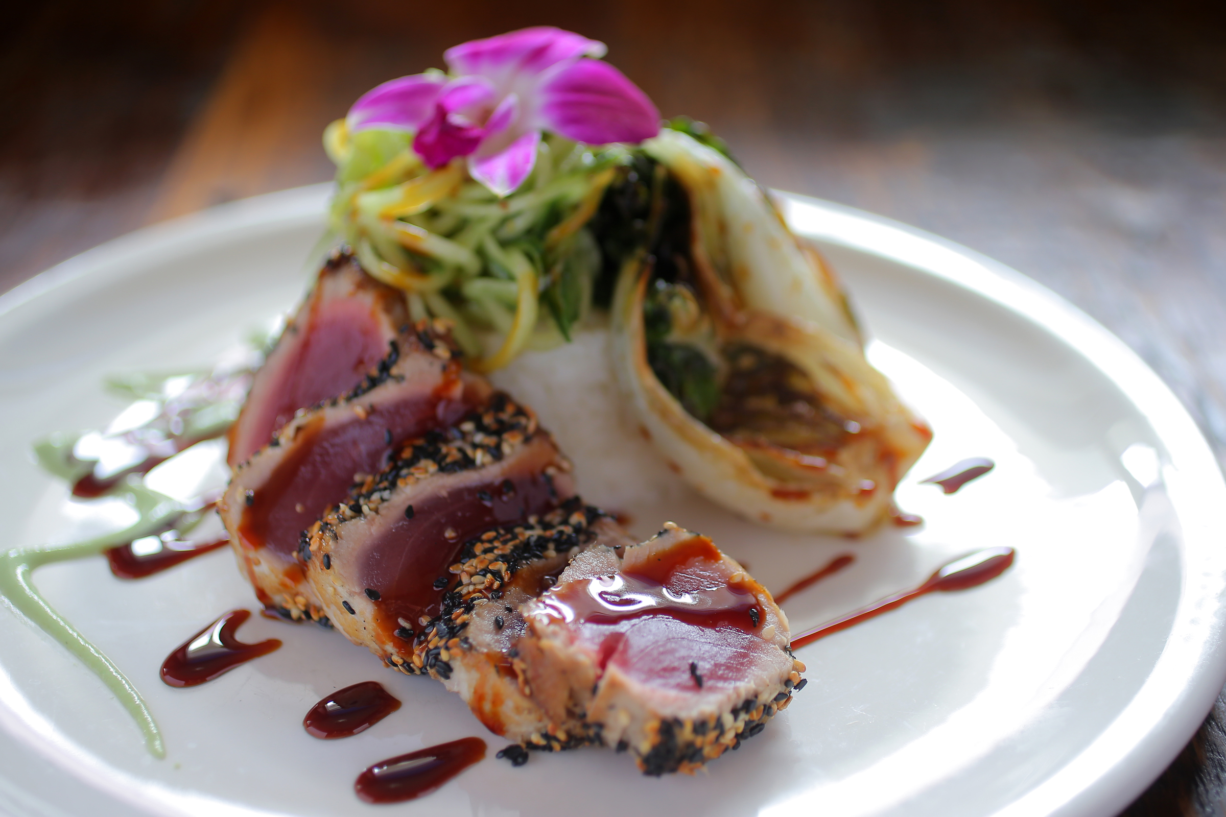 Sesame-seed-crusted yellowfin tuna is a savory entree.