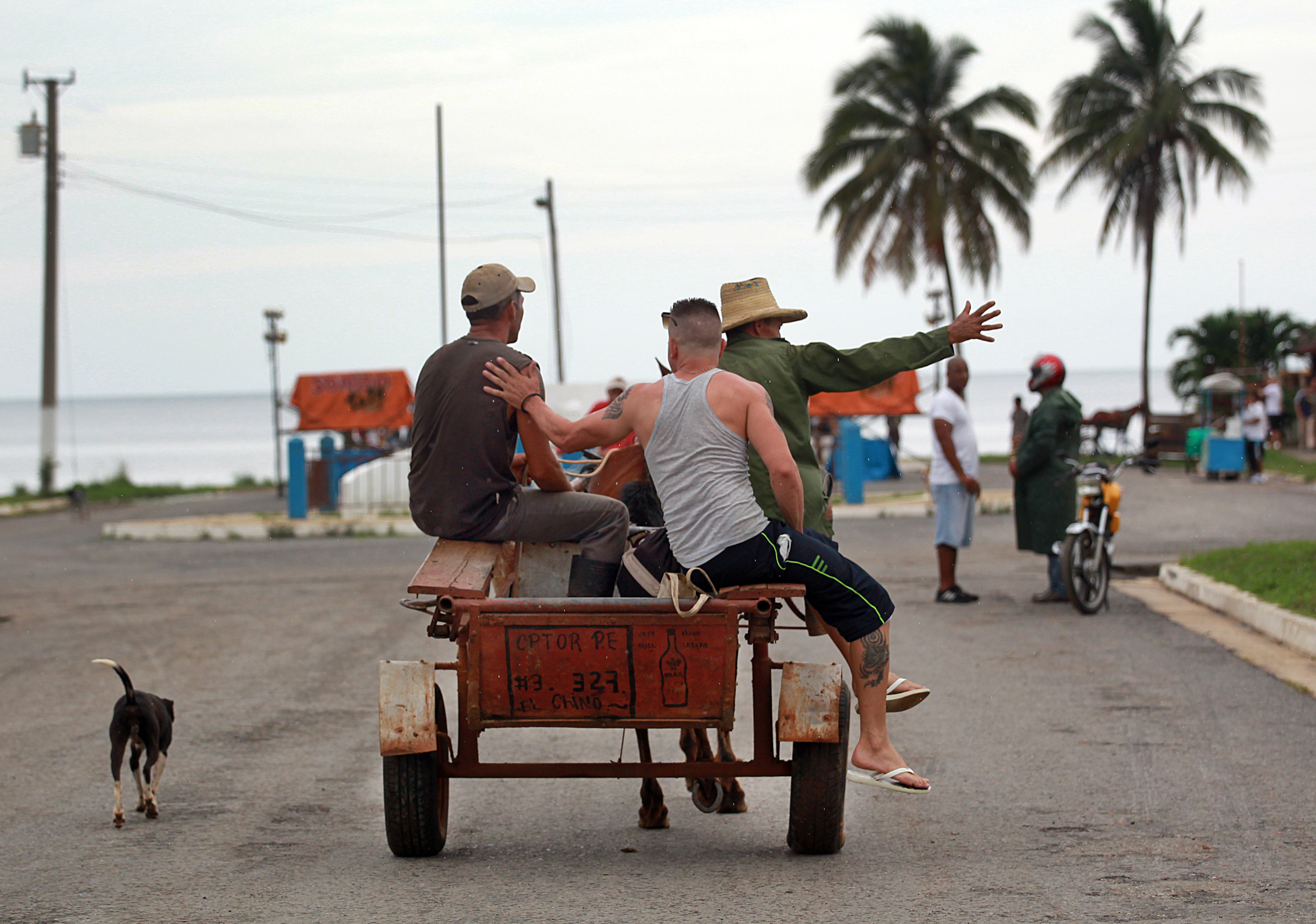 On a Saturday afternoon in Puerto Esperanza, residents get ready for a town party.