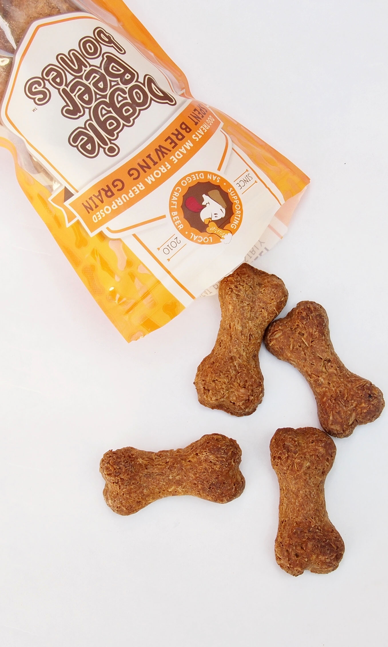 David Crane, a home brewer, mixes beer leftovers with eggs, butter, and barley to make dog biscuits.