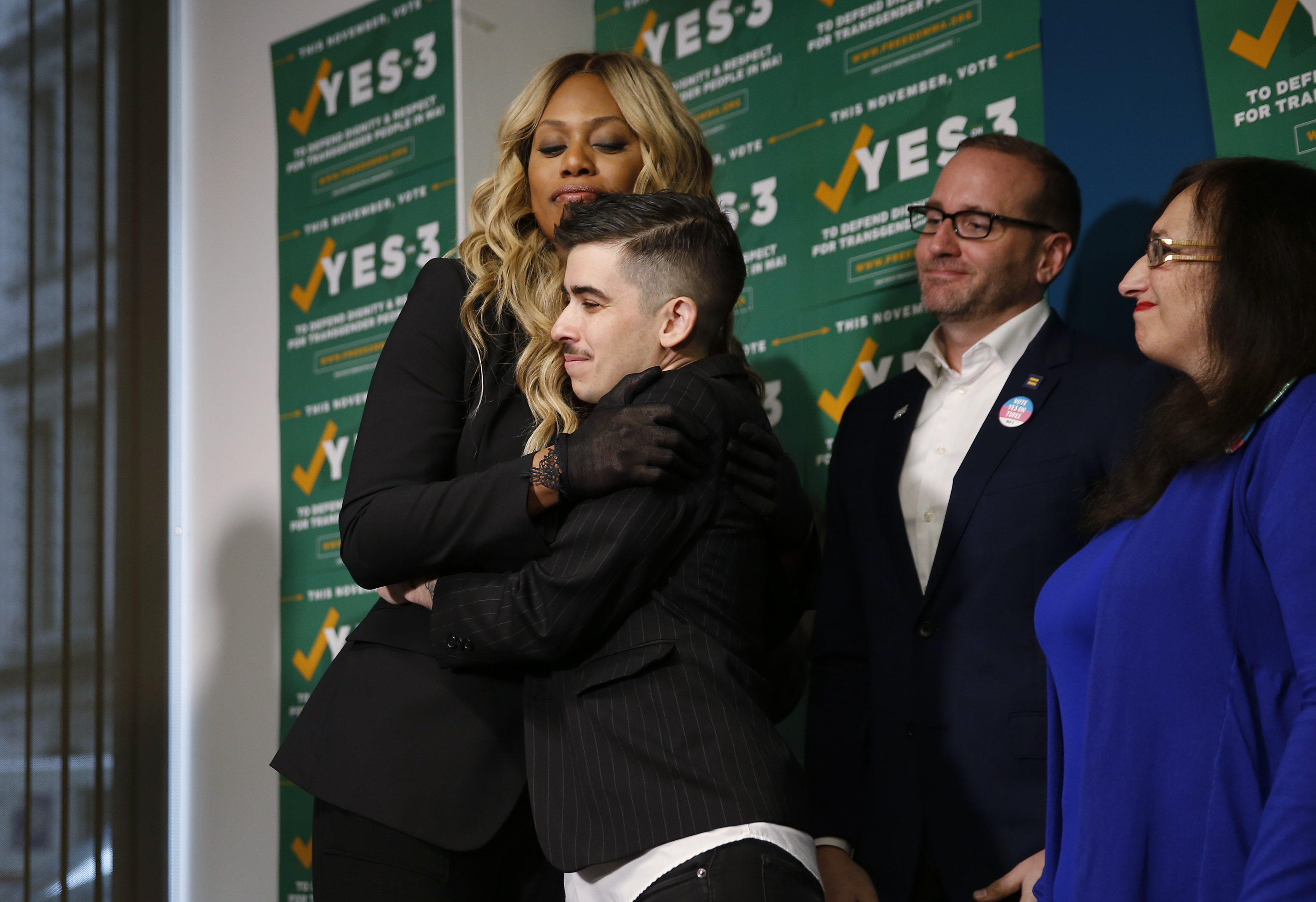 Cox hugged Chase Strangio, staff attorney at ACLU LGBT & HIV Project, on Wednesday.