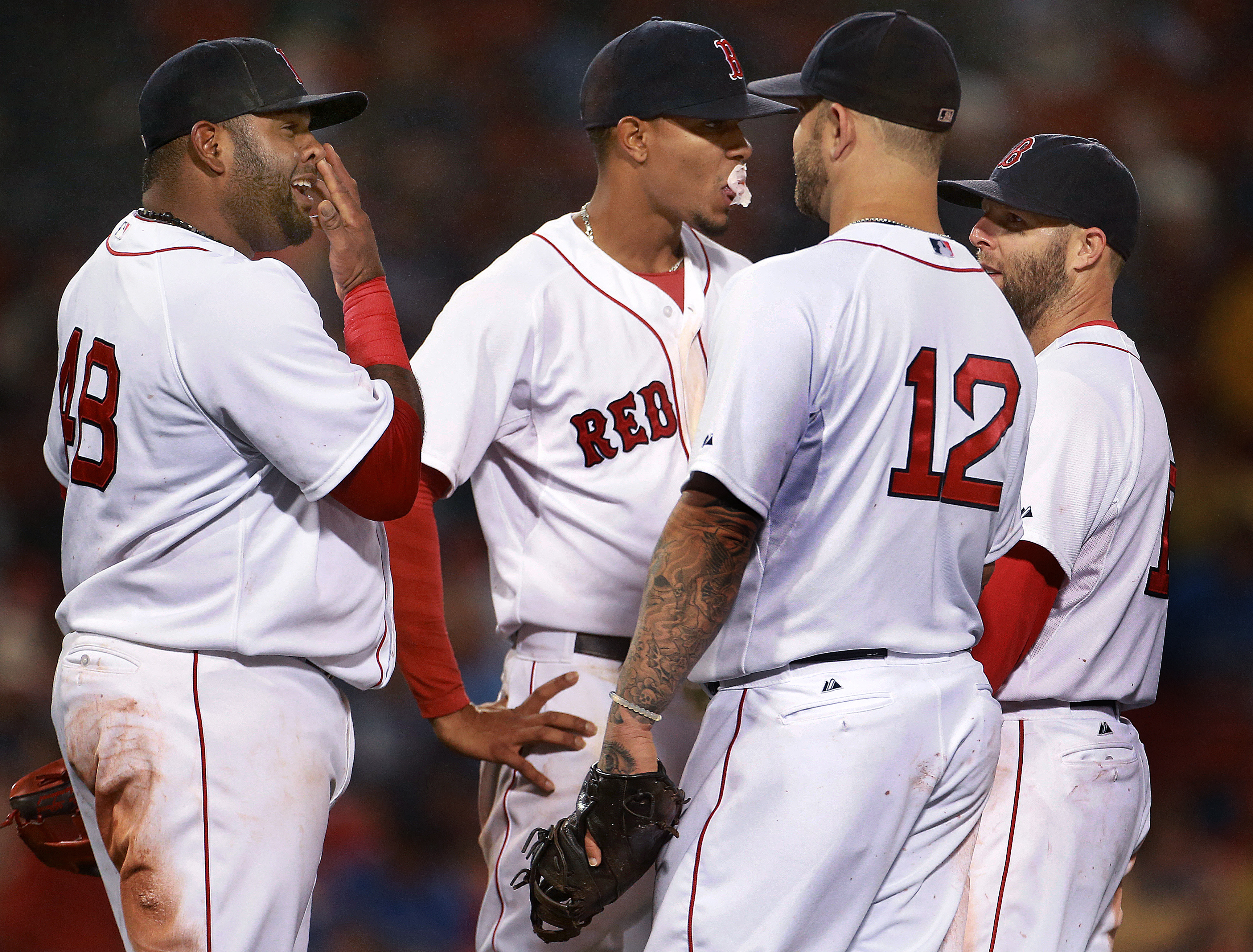 From left: Pablo Sandoval, Bogaerts, Mike Napoli, and Dustin Pedroia waited for a new pitcher to come in from the bullpen in the ninth inning.