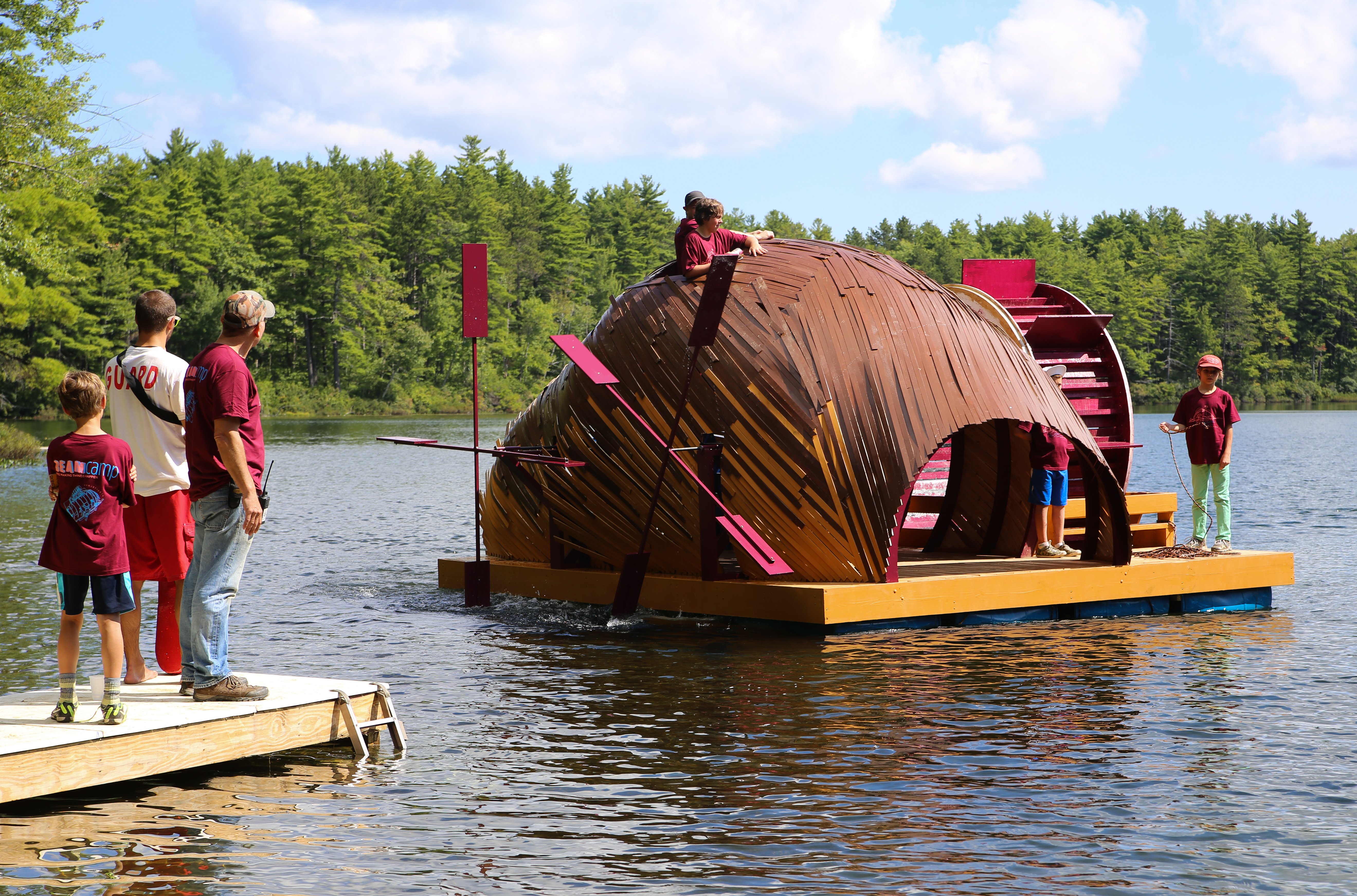At Beam in New Hampshire, campers built a floating vessel powered by a human hamster wheel.